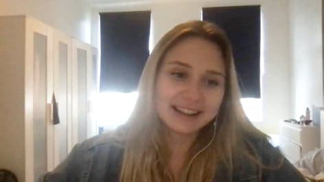 Maria smiling at the camera as she talking about facing the fear of insomnia