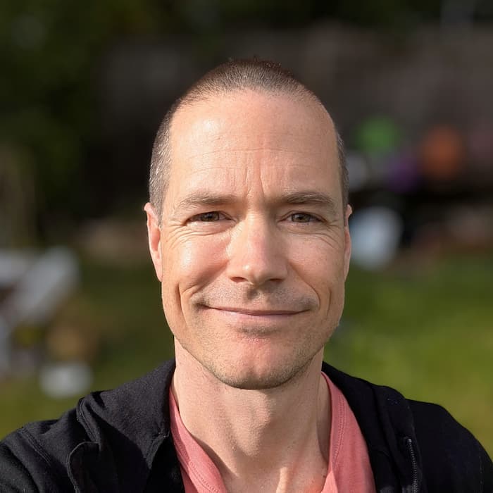 Martin Reed standing outside and smiling at the camera